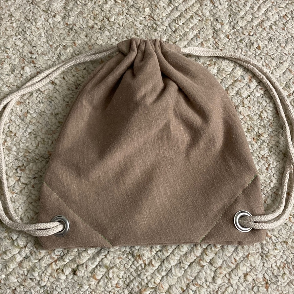 Child’s Tan Drawstring Backpack with Green Inner Lining